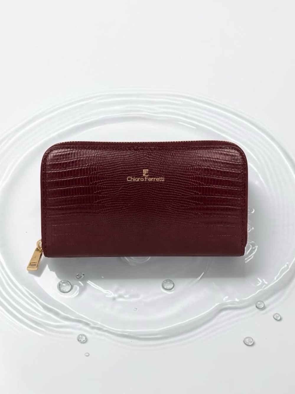 Chiara Ferretti Burgundy Leather zip-around wallet